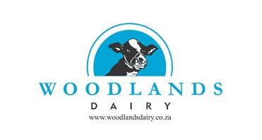 Woodlands Dairy Logo